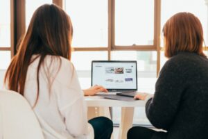 women looking at website